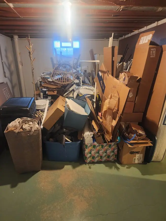 Roll-off dumpster container at job site for 2 Yard Dumpster Rental in Cocoa Beach